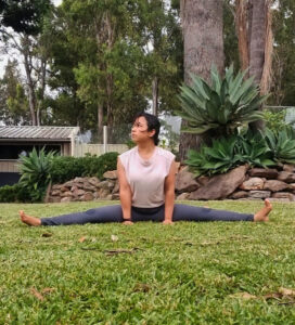 girl doing middle splits beginner practice